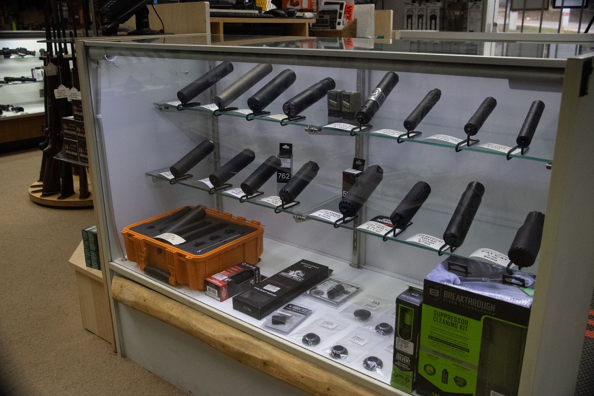Suppressors on the counter at Elk River Guns
